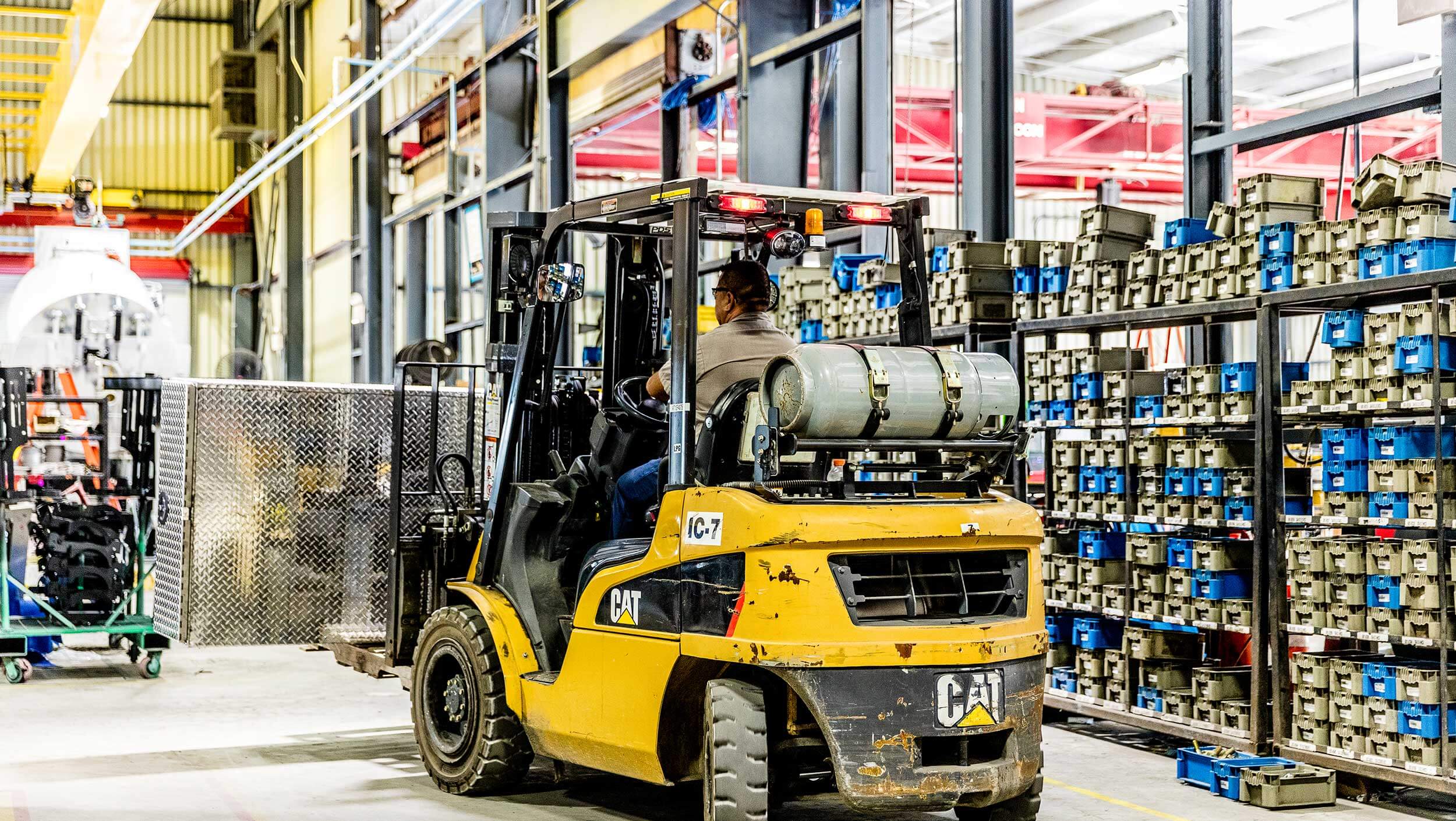 A person using a forklift